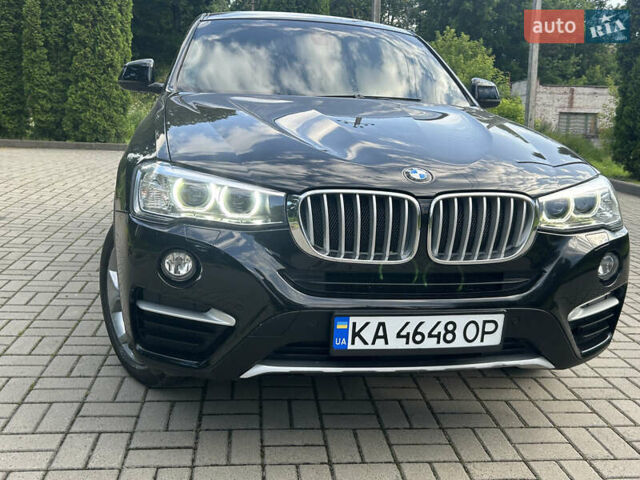 Черный БМВ Х4, объемом двигателя 2 л и пробегом 121 тыс. км за 23000 $, фото 1 на Automoto.ua