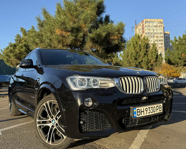 Чорний БМВ Х4, об'ємом двигуна 2 л та пробігом 97 тис. км за 25500 $, фото 1 на Automoto.ua