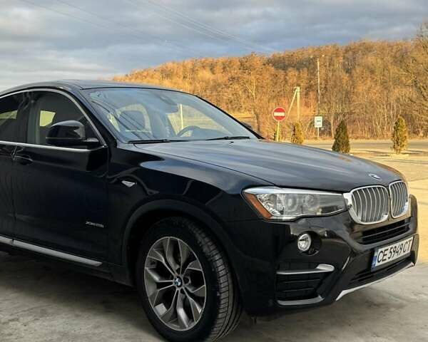 Чорний БМВ Х4, об'ємом двигуна 2 л та пробігом 98 тис. км за 27000 $, фото 1 на Automoto.ua