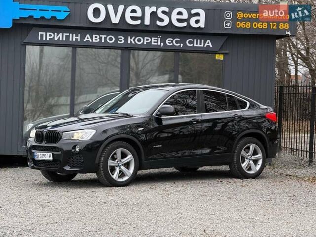 Черный БМВ Х4, объемом двигателя 2 л и пробегом 176 тыс. км за 19900 $, фото 1 на Automoto.ua
