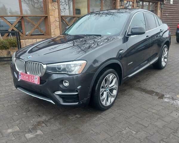 Черный БМВ Х4, объемом двигателя 2 л и пробегом 256 тыс. км за 14800 $, фото 1 на Automoto.ua