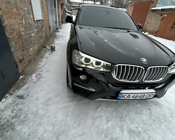 Черный БМВ Х4, объемом двигателя 2 л и пробегом 133 тыс. км за 20500 $, фото 1 на Automoto.ua