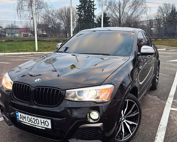 Черный БМВ Х4, объемом двигателя 2.98 л и пробегом 77 тыс. км за 33800 $, фото 1 на Automoto.ua