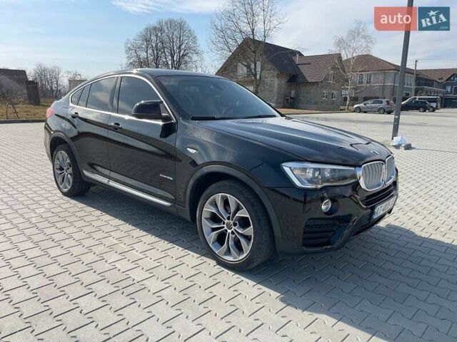 Черный БМВ Х4, объемом двигателя 2 л и пробегом 201 тыс. км за 17800 $, фото 1 на Automoto.ua