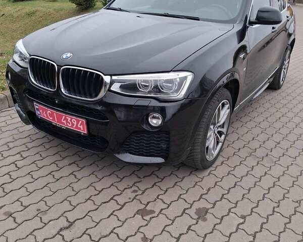 Черный БМВ Х4, объемом двигателя 2 л и пробегом 231 тыс. км за 26500 $, фото 1 на Automoto.ua