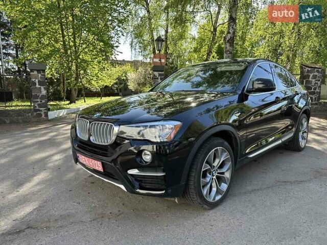 Чорний БМВ Х4, об'ємом двигуна 2 л та пробігом 224 тис. км за 16950 $, фото 1 на Automoto.ua