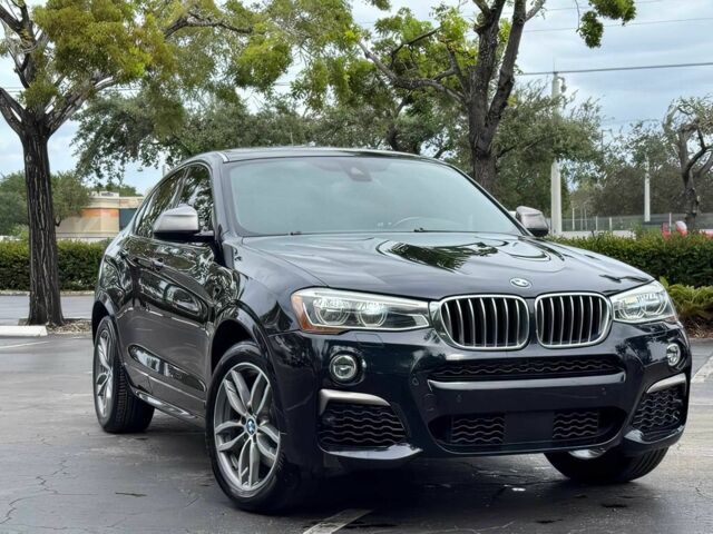 Чорний БМВ Х4, об'ємом двигуна 3 л та пробігом 37 тис. км за 19900 $, фото 1 на Automoto.ua