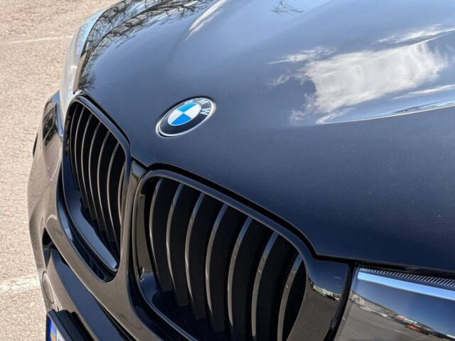 Черный БМВ Х4, объемом двигателя 3 л и пробегом 215 тыс. км за 25300 $, фото 1 на Automoto.ua