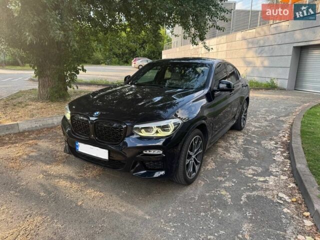 Черный БМВ Х4, объемом двигателя 2 л и пробегом 133 тыс. км за 33900 $, фото 1 на Automoto.ua