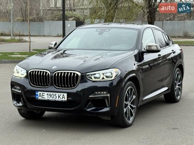 Черный БМВ Х4, объемом двигателя 3 л и пробегом 27 тыс. км за 42500 $, фото 1 на Automoto.ua