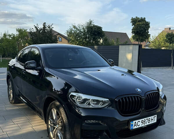 Черный БМВ Х4, объемом двигателя 2 л и пробегом 259 тыс. км за 34900 $, фото 1 на Automoto.ua