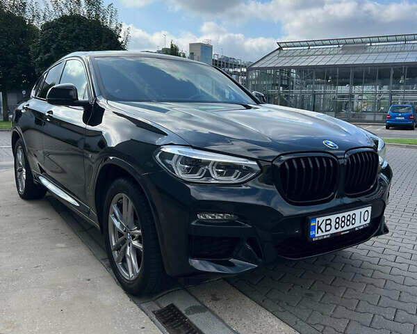 Черный БМВ Х4, объемом двигателя 2 л и пробегом 82 тыс. км за 48900 $, фото 1 на Automoto.ua