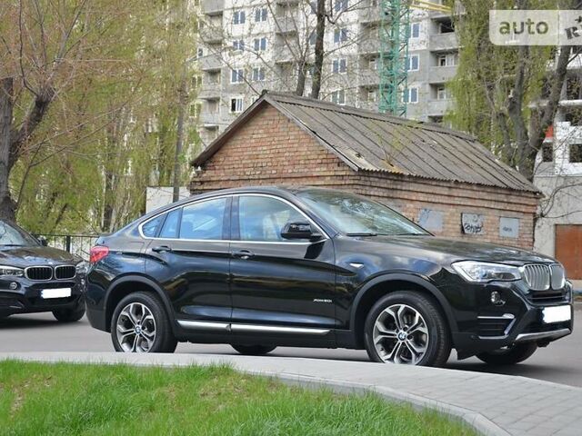 Чорний БМВ Х4, об'ємом двигуна 2 л та пробігом 40 тис. км за 40000 $, фото 1 на Automoto.ua