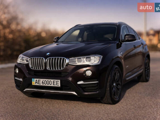 Коричневый БМВ Х4, объемом двигателя 2 л и пробегом 200 тыс. км за 21500 $, фото 1 на Automoto.ua