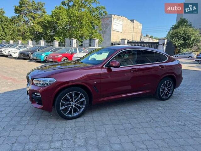 Красный БМВ Х4, объемом двигателя 2 л и пробегом 71 тыс. км за 38500 $, фото 1 на Automoto.ua
