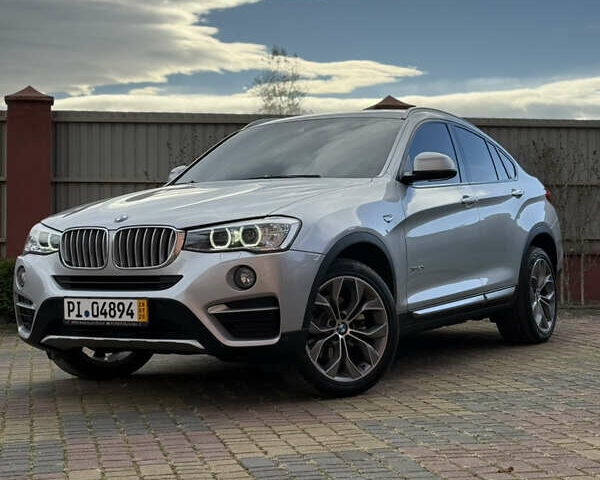Сірий БМВ Х4, об'ємом двигуна 2 л та пробігом 105 тис. км за 24999 $, фото 1 на Automoto.ua
