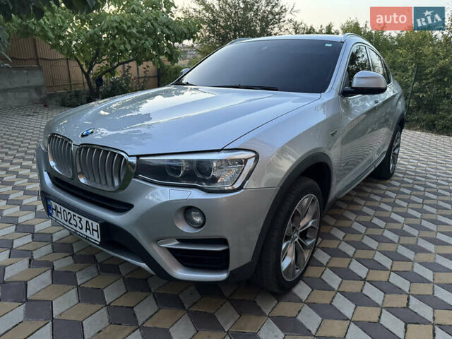 Серый БМВ Х4, объемом двигателя 2 л и пробегом 125 тыс. км за 25800 $, фото 1 на Automoto.ua