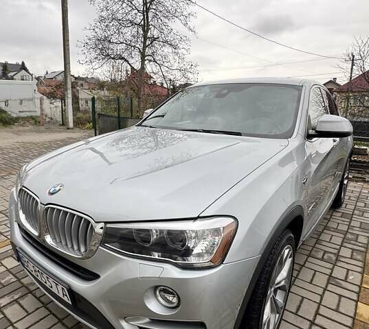 Серый БМВ Х4, объемом двигателя 2 л и пробегом 110 тыс. км за 30000 $, фото 1 на Automoto.ua