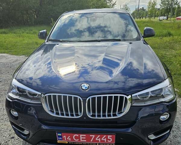 Синий БМВ Х4, объемом двигателя 2 л и пробегом 145 тыс. км за 19700 $, фото 1 на Automoto.ua