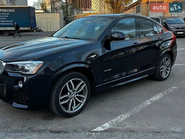 Синий БМВ Х4, объемом двигателя 2 л и пробегом 93 тыс. км за 24800 $, фото 1 на Automoto.ua