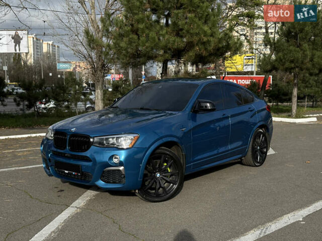 Синій БМВ Х4, об'ємом двигуна 2.98 л та пробігом 130 тис. км за 28300 $, фото 1 на Automoto.ua
