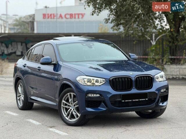 Синий БМВ Х4, объемом двигателя 2 л и пробегом 140 тыс. км за 30000 $, фото 1 на Automoto.ua