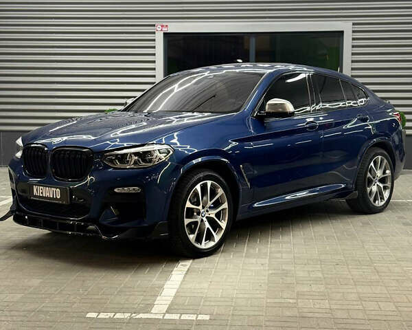 Синий БМВ Х4, объемом двигателя 3 л и пробегом 105 тыс. км за 39500 $, фото 1 на Automoto.ua