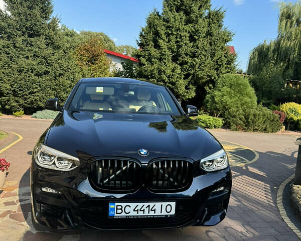 Синий БМВ Х4, объемом двигателя 2 л и пробегом 80 тыс. км за 47300 $, фото 1 на Automoto.ua