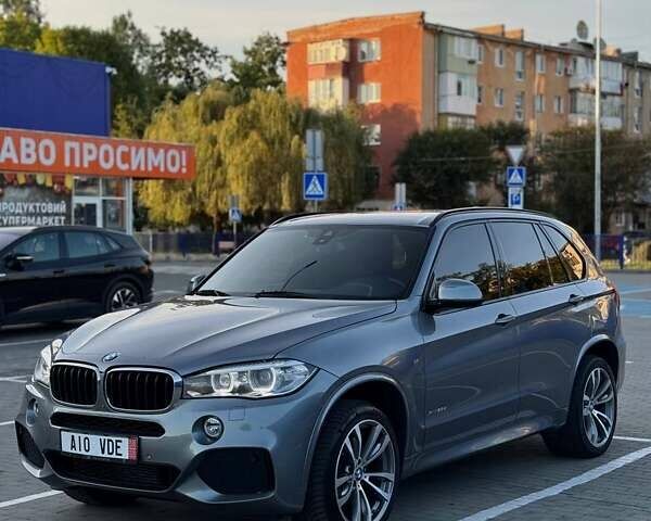 Серый БМВ Х5 М, объемом двигателя 3 л и пробегом 299 тыс. км за 29999 $, фото 1 на Automoto.ua