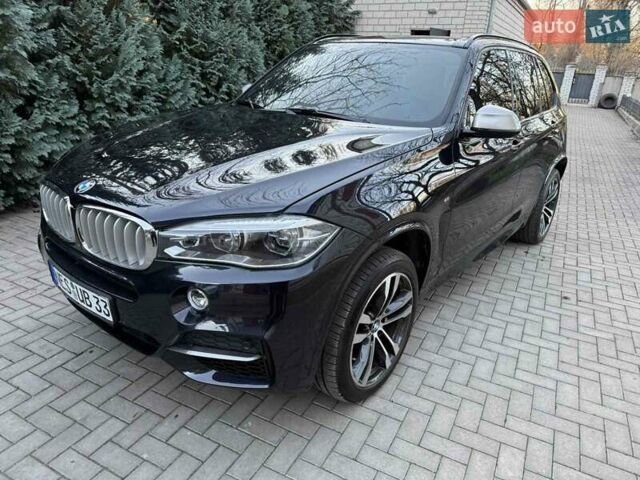 Синий БМВ Х5 М, объемом двигателя 3 л и пробегом 163 тыс. км за 39900 $, фото 1 на Automoto.ua