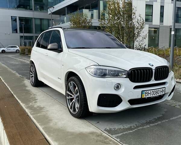 Белый БМВ Х5, объемом двигателя 4.4 л и пробегом 74 тыс. км за 39000 $, фото 1 на Automoto.ua