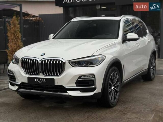 Белый БМВ Х5, объемом двигателя 3 л и пробегом 94 тыс. км за 49999 $, фото 1 на Automoto.ua