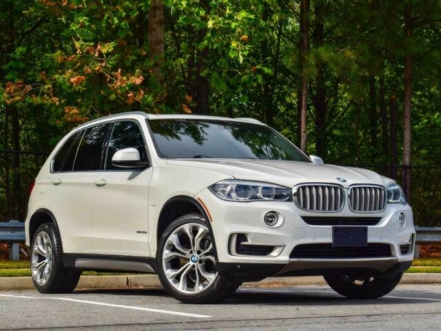 Білий БМВ Х5, об'ємом двигуна 3 л та пробігом 39 тис. км за 20000 $, фото 1 на Automoto.ua