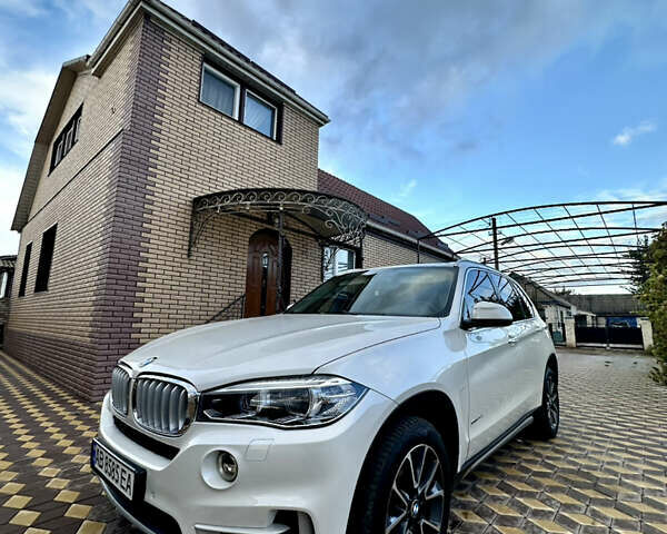 Белый БМВ Х5, объемом двигателя 2.98 л и пробегом 57 тыс. км за 28999 $, фото 1 на Automoto.ua