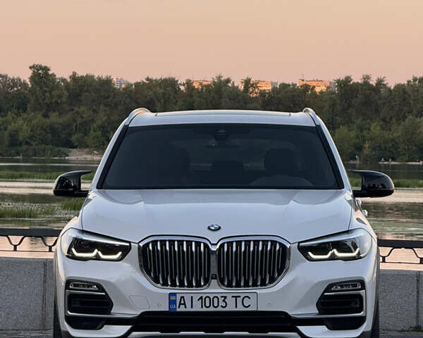 Белый БМВ Х5, объемом двигателя 3 л и пробегом 65 тыс. км за 49800 $, фото 1 на Automoto.ua