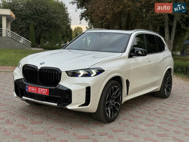 Белый БМВ Х5, объемом двигателя 3 л и пробегом 74 тыс. км за 55000 $, фото 1 на Automoto.ua