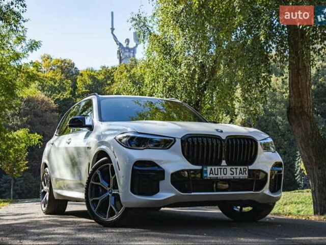 Белый БМВ Х5, объемом двигателя 3 л и пробегом 63 тыс. км за 74900 $, фото 1 на Automoto.ua