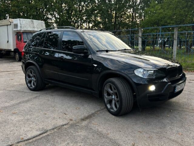 Чорний БМВ Х5, об'ємом двигуна 3 л та пробігом 300 тис. км за 11994 $, фото 1 на Automoto.ua