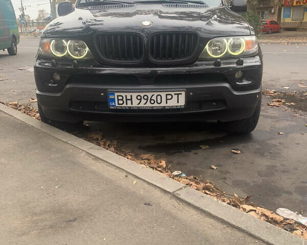 Чорний БМВ Х5, об'ємом двигуна 4.4 л та пробігом 129 тис. км за 8000 $, фото 1 на Automoto.ua