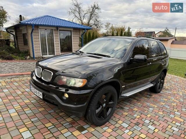 Черный БМВ Х5, объемом двигателя 4.4 л и пробегом 330 тыс. км за 6900 $, фото 1 на Automoto.ua
