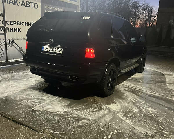 Черный БМВ Х5, объемом двигателя 4.4 л и пробегом 323 тыс. км за 7250 $, фото 1 на Automoto.ua
