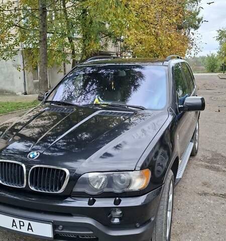 Черный БМВ Х5, объемом двигателя 3 л и пробегом 323 тыс. км за 9800 $, фото 1 на Automoto.ua