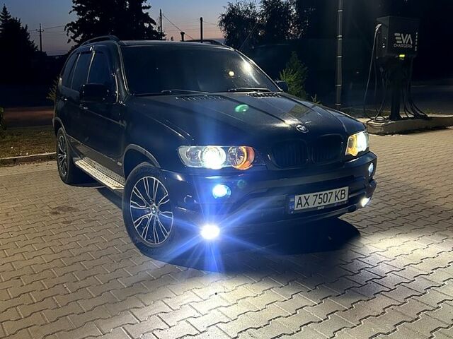 Черный БМВ Х5, объемом двигателя 4.4 л и пробегом 248 тыс. км за 8000 $, фото 1 на Automoto.ua