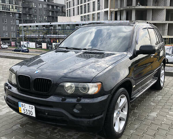 Чорний БМВ Х5, об'ємом двигуна 3 л та пробігом 400 тис. км за 8000 $, фото 1 на Automoto.ua