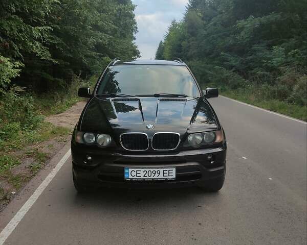 Черный БМВ Х5, объемом двигателя 3 л и пробегом 297 тыс. км за 8750 $, фото 1 на Automoto.ua