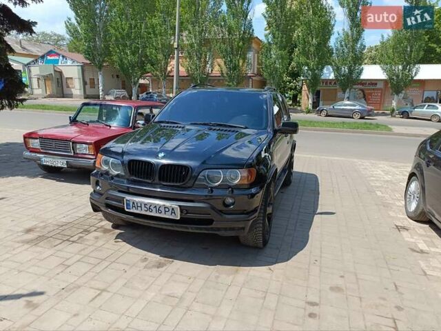 Черный БМВ Х5, объемом двигателя 4.4 л и пробегом 280 тыс. км за 14500 $, фото 1 на Automoto.ua