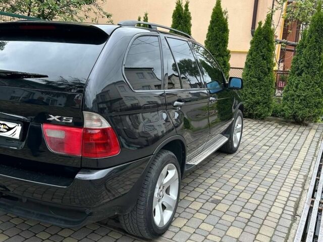 Черный БМВ Х5, объемом двигателя 3 л и пробегом 296 тыс. км за 8900 $, фото 1 на Automoto.ua