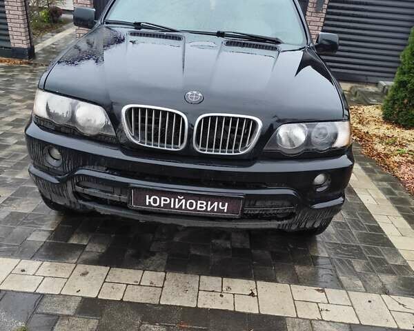 Чорний БМВ Х5, об'ємом двигуна 3 л та пробігом 400 тис. км за 7400 $, фото 1 на Automoto.ua
