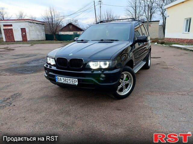 Черный БМВ Х5, объемом двигателя 2.9 л и пробегом 323 тыс. км за 12000 $, фото 1 на Automoto.ua