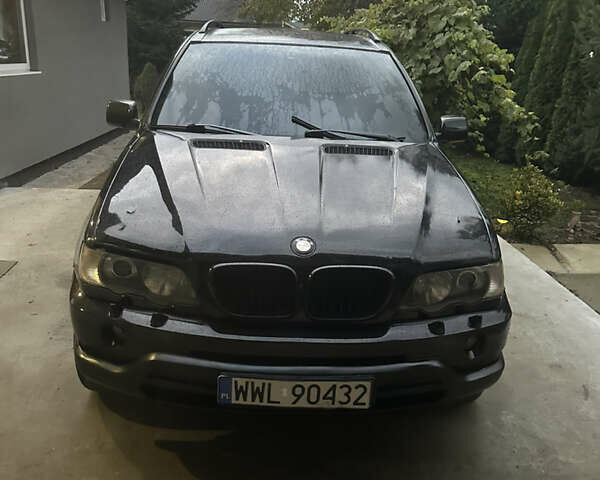 Чорний БМВ Х5, об'ємом двигуна 3 л та пробігом 300 тис. км за 4500 $, фото 1 на Automoto.ua